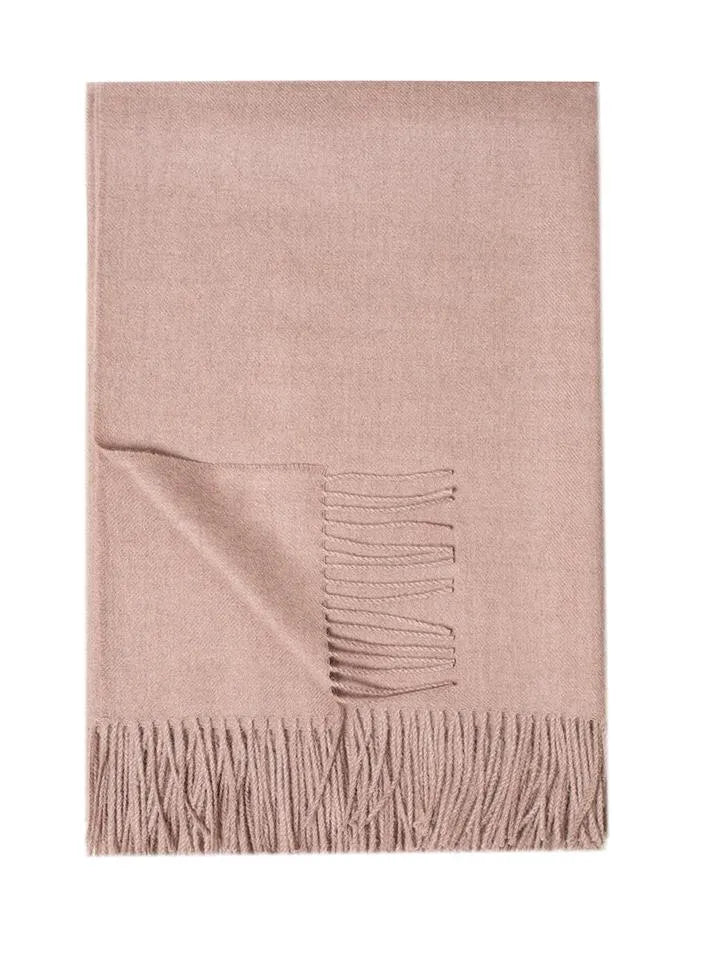 Paris Baby Alpaca Throw in soft beige, featuring delicate fringe details