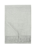 Paris Baby Alpaca Throw in light gray with delicate fringe, displayed hanging against a white background